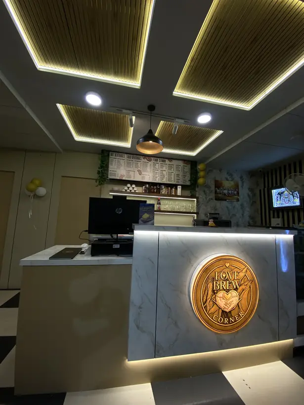 The counter with the brass Love Brew Corner medallion
